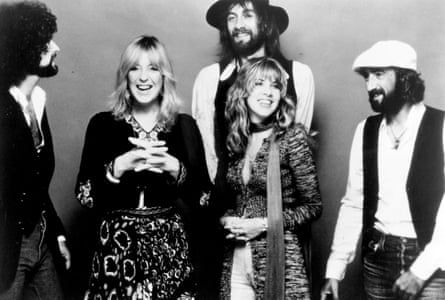 Lindsey Buckingham, Christine McVie, Mick Fleetwood, Stevie Nicks and John McVie pose for a portrait in 1977.