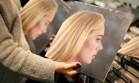 Copies of Adele’s album 30, which has topped the UK chart.