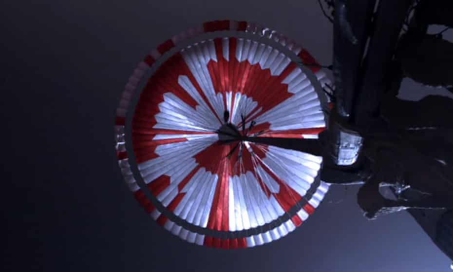 Nasa’s Perseverance rover took this photo of the parachute as it was lowered to the surface of Mars.