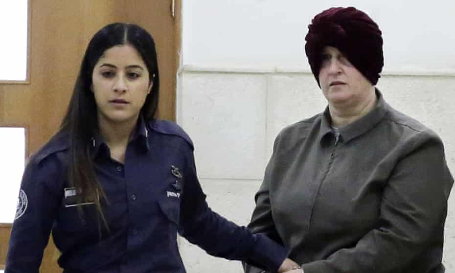 Malka Leifer, right, is escorted to an earlier hearing