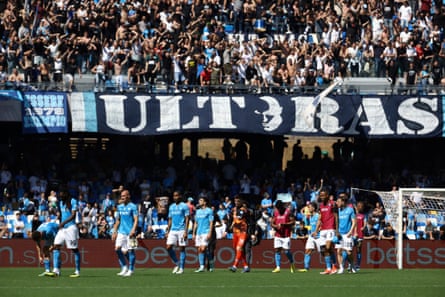 Napoli players are roared on by their supporters