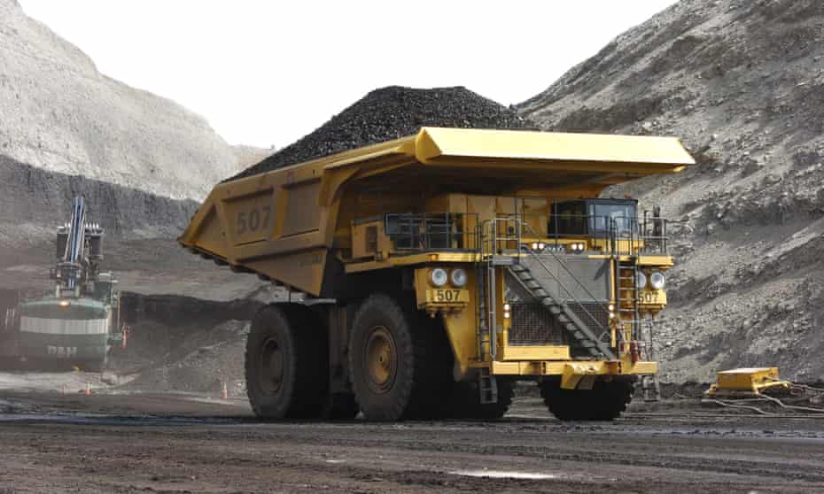 A mining dumper truck hauls coal.