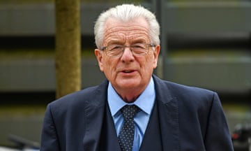 David McLean in a suit outside the court building
