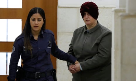 Malka Leifer, a former Australian teacher accused of dozens of cases of sexual abuse of girls at a school, arrives for a hearing at the district court in Jerusalem, Israel.