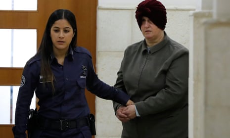 Malka Leifer, a former teacher accused of dozens of cases of sexual abuse of girls at a school in Melbourne, arrives for a hearing at the district court in Jerusalem in February 2018.
