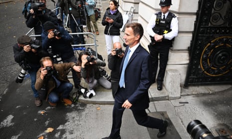 The new chancellor, Jeremy Hunt, in Whitehall on Friday after his appointment by the prime minister, Liz Truss. Photograph: Leon Neal/Getty Images