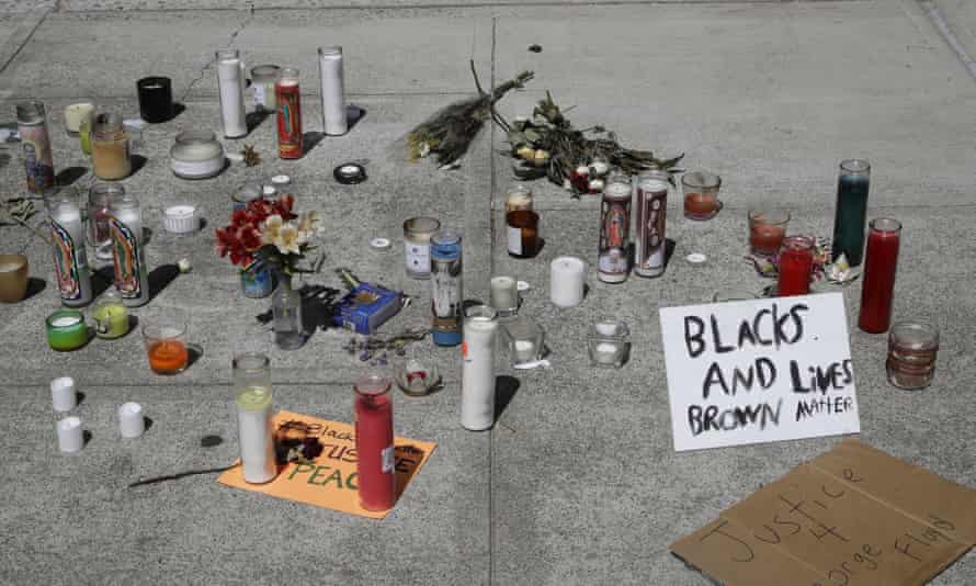 A memorial in front of Vallejo’s city hall bears a sign reading ‘Blacks and Brown lives matter’.