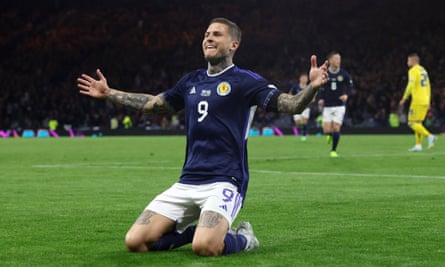 Lyndon Dykes celebrates scoring his second goal for Scotland in the win