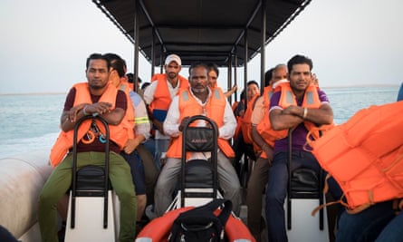 Workers from The Heart of Europe, a cluster of six islands on The World in Dubai, aboard a speedboat to take them back to the mainland after a day’s work.