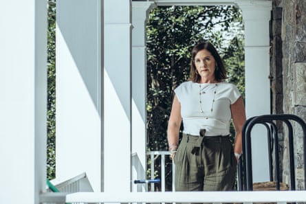 Rebecca Kelly Slaughter standing under white arches outside at her home in Maryland
