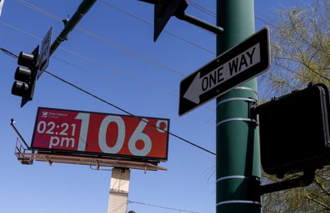 a digital billboard reads '106 degrees'