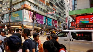 People and cars on Sai Yeung Choi Street South