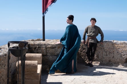 woman and man stand outside