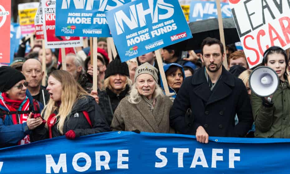 Dame Vivienne Westwood (centre) and actor Ralf Little (second right) take part in a protest