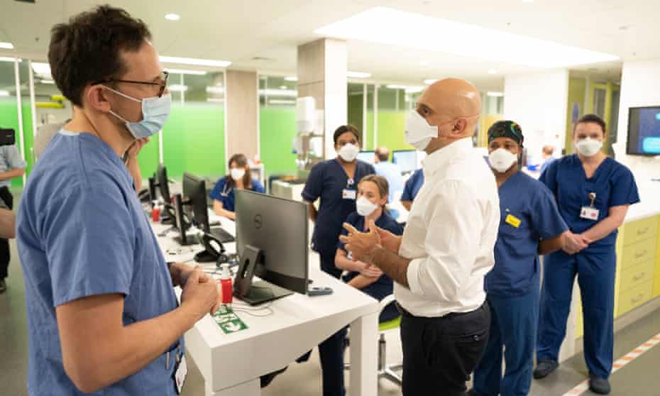 Health secretary Sajid Javid talking to Steve James a consultant at King’s College hospital in London.