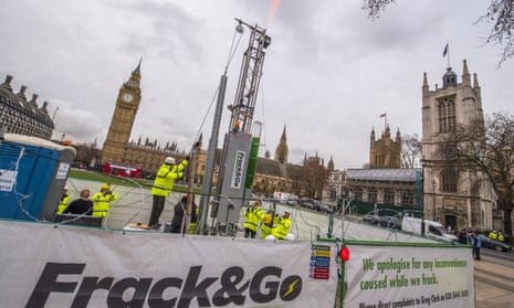 Greenpeace workers protest against fracking outside Westminster, London.