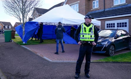 Police officers and a forensic tent outside Nicola Sturgeon's home in April