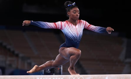 Simone Biles competes during the beam final at Tokyo 2020
