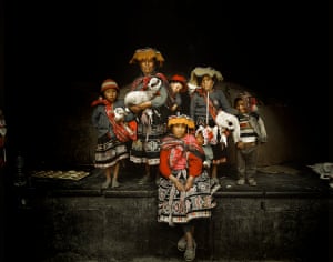 Quechua people, Peru.
The Quechua are the indigenous peoples of the highlands of Peru. Here, a Quechua family from the provinces of Quito pose proudly for the camera. Children, animals and produce are all in tow as the ladies prepare themselves for the weekly market .
