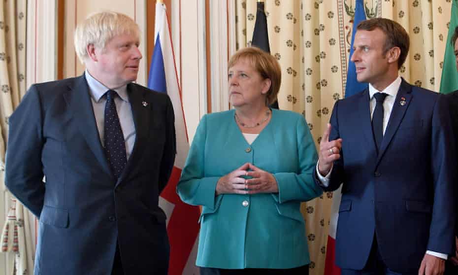 Boris Johnson with Angela Merkel and Emmanuel Macron at the EU meeting during the G7 summit in 2019