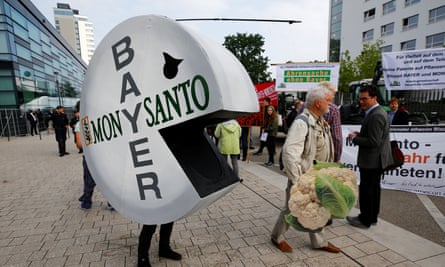 Activists protest against the merger of Bayer and Monsanto in Bonn, Germany, in 2018.