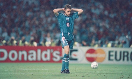 Gareth Southgate reacts after missing his penalty to hand Germany victory in the Euro 96 semi-final.
