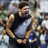 Ben Shelton clenches his fists and shouts triumphantly after his stunning US Open win.