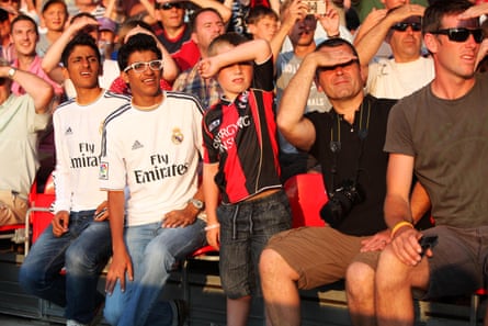 Bournemouth fans shield their eyes from the sun during the friendly against Real Madrid