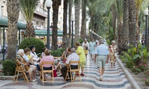 Elderly people sitting together in Alicante, Spain