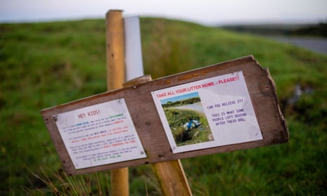 Sign warning visitors to take litter home