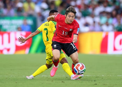 South Korea's Lee Kang-in in action with South Africa's Oswin Appollis