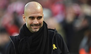 Manchester City manager Pep Guardiola arrives for the English Premier League football match between Liverpool and Manchester City at Anfield in Liverpool, north west England. Manchester City manager Pep Guardiola has admitted a charge from the Football Association for wearing a political symbol, the English governing body announced on March 5, 2018. Guardiola has said he wears a yellow ribbon to support imprisoned pro-independence politicians in his native Catalonia. / AFP PHOTO / Oli SCARFF / RESTRICTED TO EDITORIAL USE. No use with unauthorized audio, video, data, fixture lists, club/league logos or ‘live’ services. Online in-match use limited to 75 images, no video emulation. No use in betting, games or single club/league/player publications. / OLI SCARFF/AFP/Getty Images