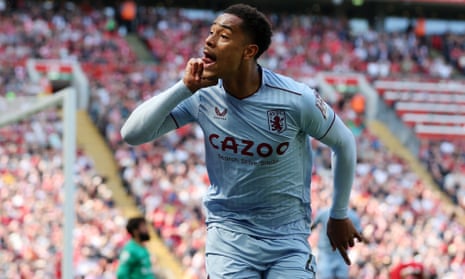 Jacob Ramsey of Aston Villa celebrates after scoring the team's first goal during the Premier League match between Liverpool and Aston Villa at Anfield.