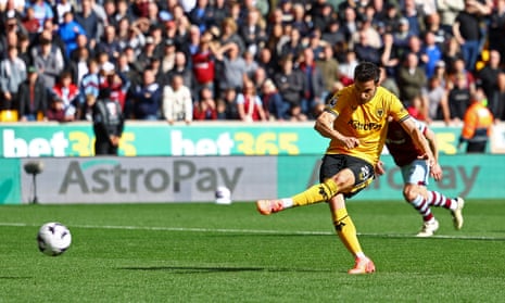 Wolverhampton Wanderers' Pablo Sarabia scores their first goal from the penalty spot against West Ham.