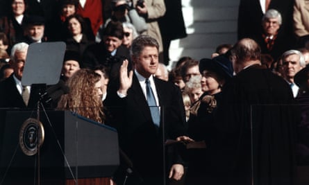 President Bill Clinton takes his oath of office, accompanied by Hillary Rodham Clinton, in 1993.