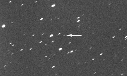 An image of space including asteroid 2023 DZ2, indicated by an arrow