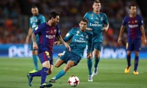 Barcelona’s Lionel Messi in action with Real Madrid’s Mateo Kovacic.