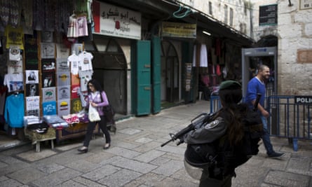An Israeli border policewoman stands guard in Jerusalem’s old city.