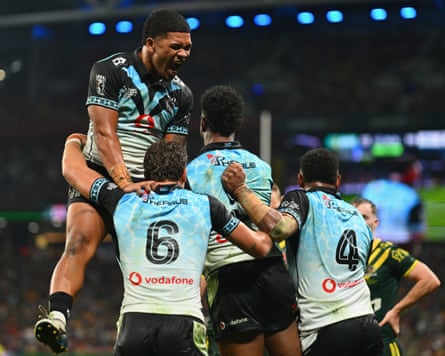 Semi Valemei celebrates a try.