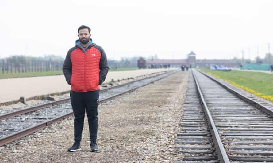 Azeem Rafiq at Auschwitz: ‘If this doesn’t move you there’s something wrong’ | Azeem Rafiq 4 Azeem Rafiq by the railway tracks leading to Auschwitz-Birkenau
