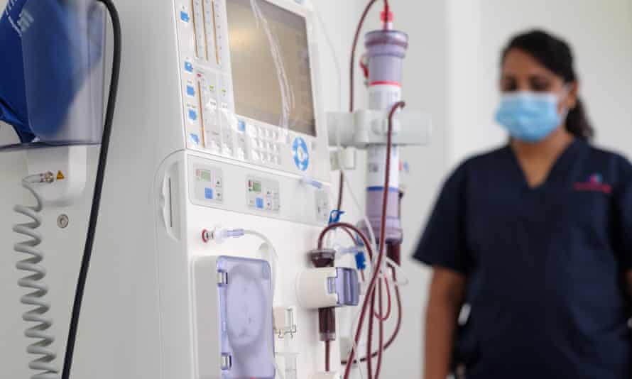 A nurse monitoring patients in the dialysis ward of the new Kidney Hub hospital in Nadi, Fiji.