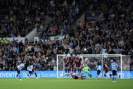 Victor Torp of Coventry City scores his team's equaliser against Aston Villa.