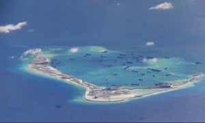 Chinese dredging vessels in the waters around Mischief Reef in the South China Sea.