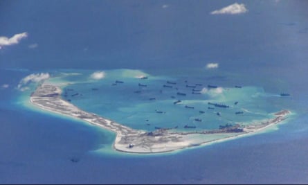 Still image from United States Navy video purportedly shows Chinese dredging vessels in the waters around Mischief Reef in the disputed Spratly Islands.