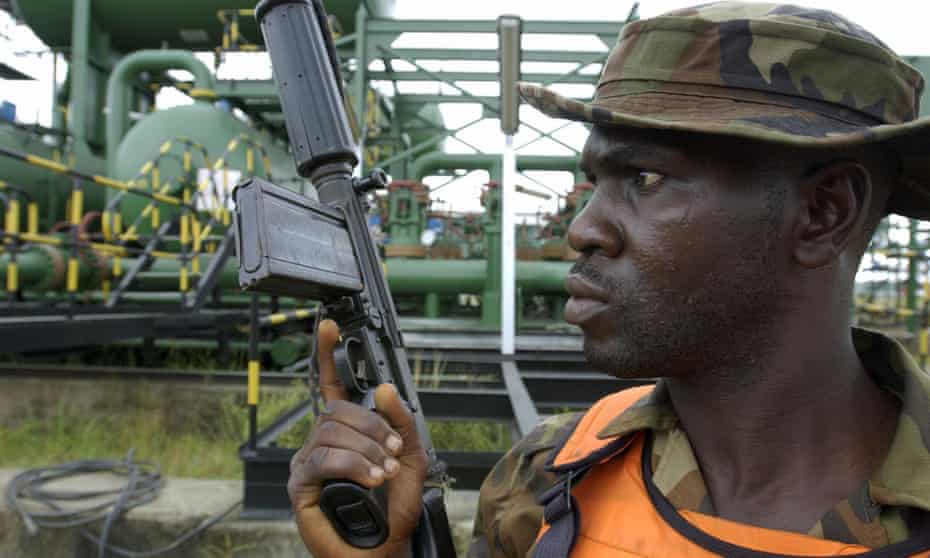A Nigerian soldier guards an oil facility in the Niger delta.