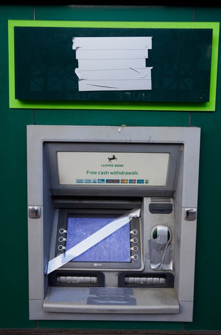 The taped-over ATM at the abandoned Lloyds bank branch in Sandbach, which closed in December 2022.