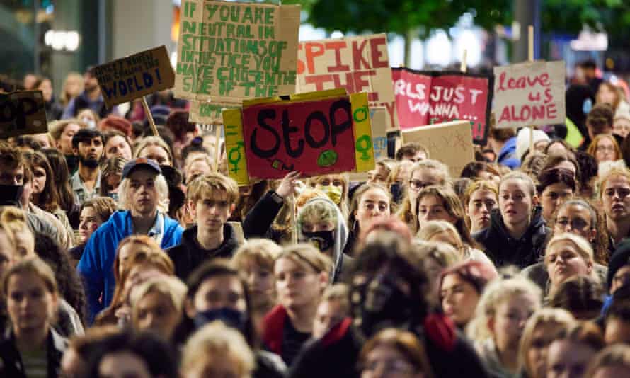 Demonstrators marching through Manchester