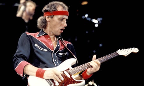 Dire Straits' Mark Knopfler performing live onstage
