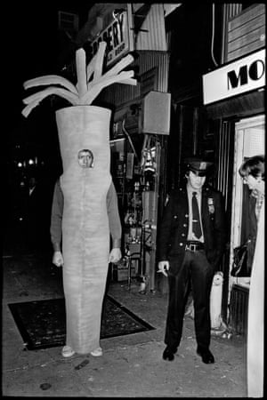 A man dressed as a carrot