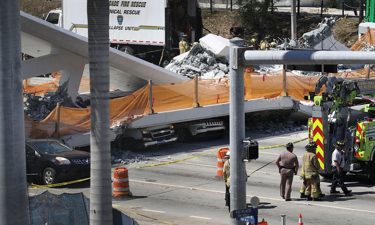 Florida bridge collapse: four dead after new walkway falls on busy road | Florida | The Guardian